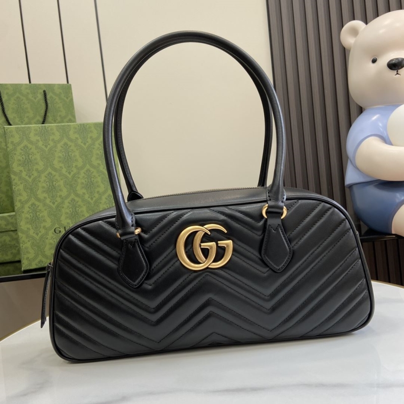 G*u*i top handle bags